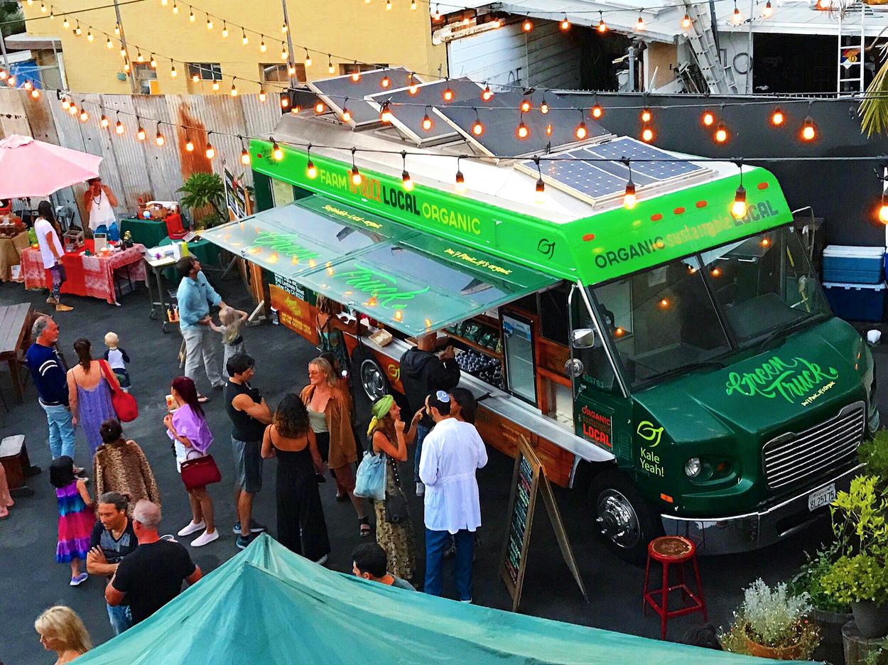 Plant based food truck serving to customers