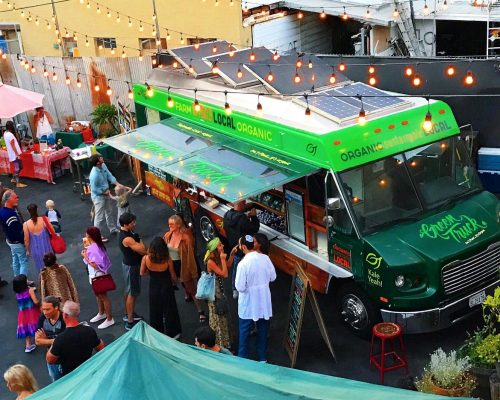 Plant based food truck serving to customers